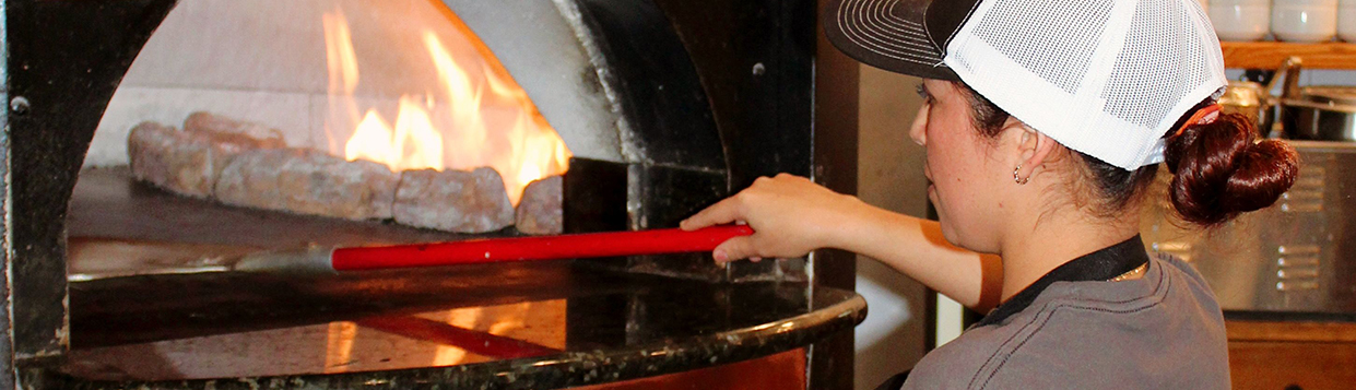 Woman using Stove